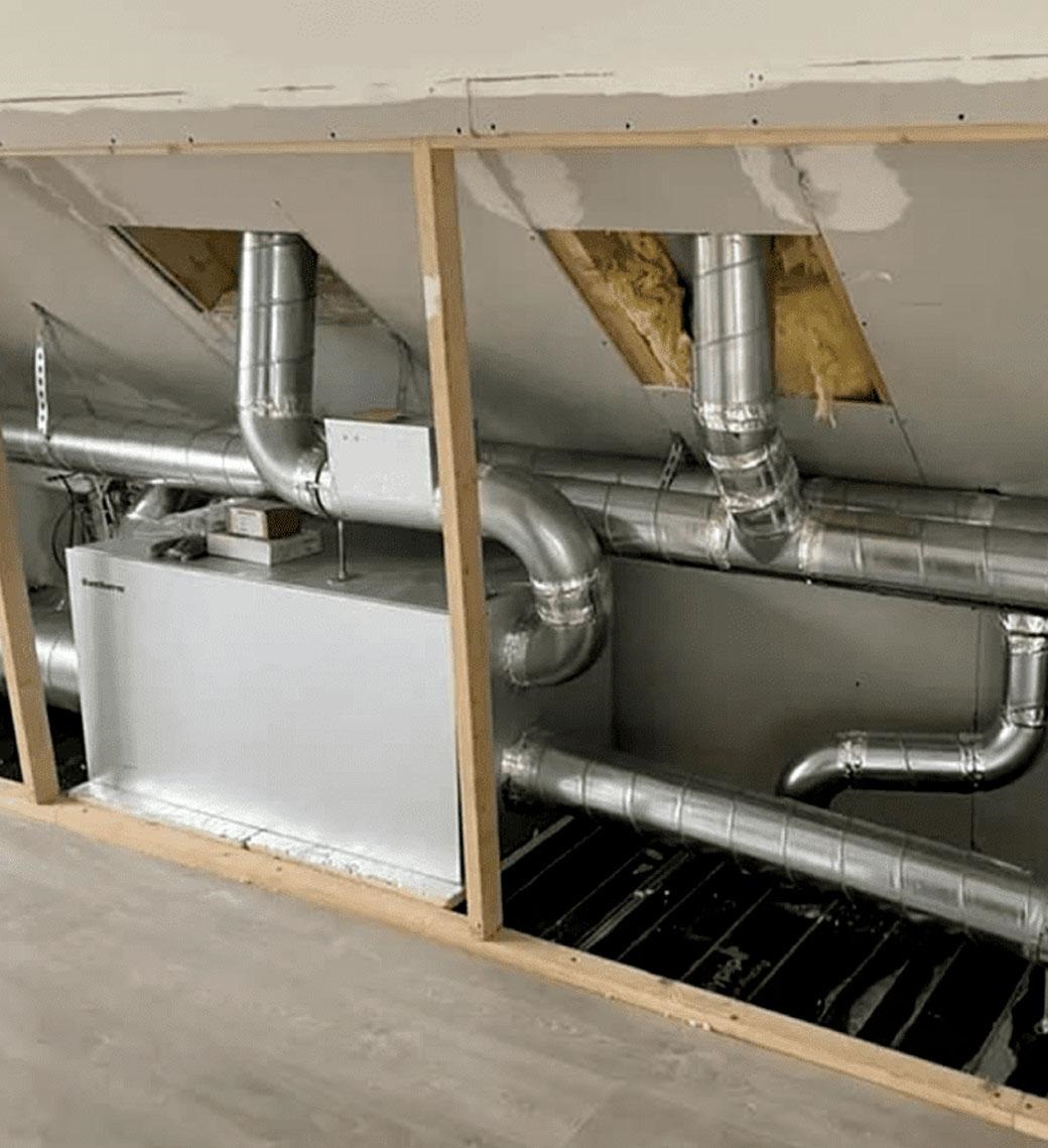 Connecting the heat recovery unit to the network of galvanized spiral ducts