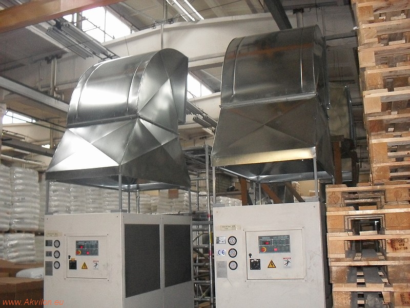 Industrial air exhaust hoods in a food production facility